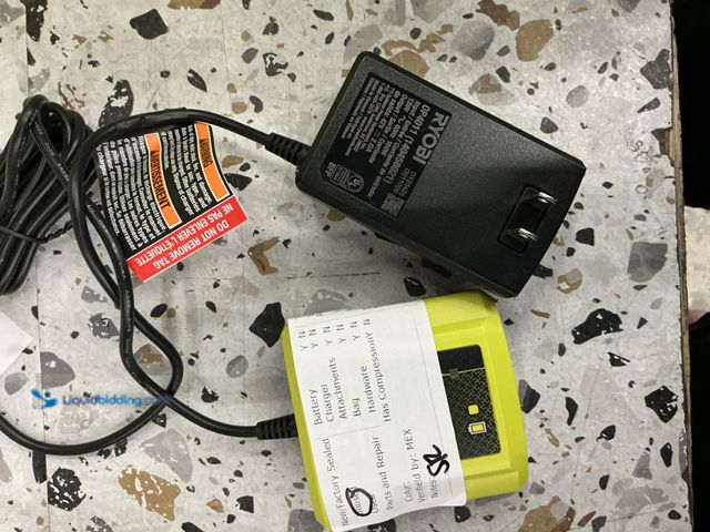 Lot 49-3564726 - Ryobi OY25421 Battery Charger, Unused.
