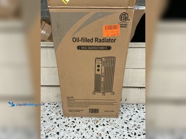 Lot 49-3538806 - Oiled filled radiator Heater,1500w, Portable Electric. Item is Used