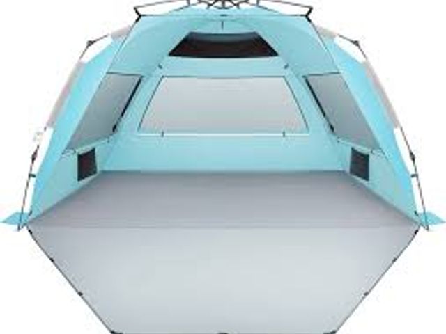 Lot 49-5581461 - OILEUS XX-Large 5-6 Person UV Pop-Up Beach Tent, Blue Roomy instant shelter includes a carrying bag,...