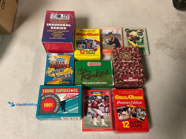 Lot 49-1810452 - COLLECTIBLE 10 SPORT CARD SETS FROM VARIOUS YEARS AND TYPES