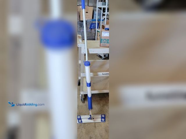 Lot 49-1814670 - 1 Other Microfiber Mop System - 18" Adjustable Pole-Water Bottle 
Make less trips to the bucket. Mic...