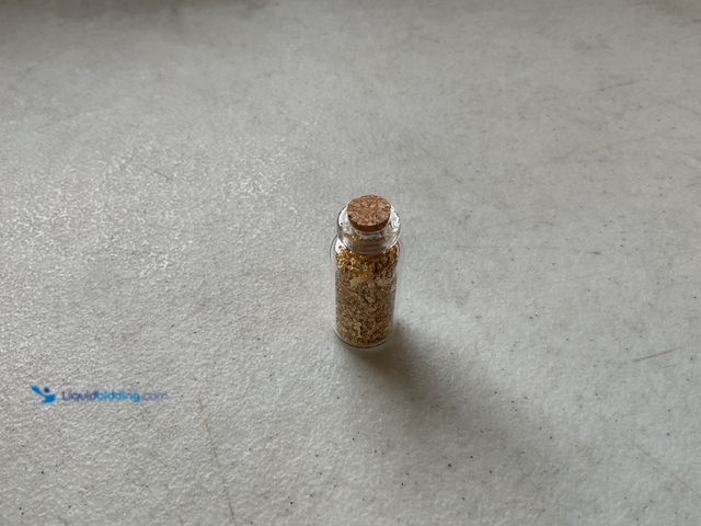 Lot 49-5515569 - RARE ONE INCH GLASS VILE OF PURE 24K GOLD FLAKES