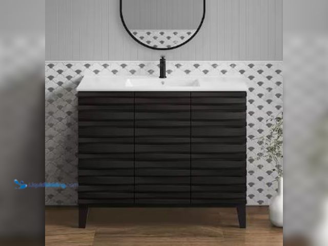 Lot 49-1522596 - Swiss Madison
Cascade 18.31 in. D x 36.13 in. W x 34.69 in. H Bathroom Vanity with Ceramic Top in B...