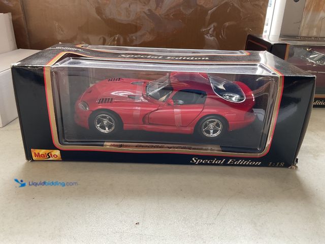 Lot 49-1830740 - COLLECTIBLE MAISTO SPECIAL EDITION 1/18 SCALE DIECAST CAR IN ORIGINAL BOX 1997 DODGE VIPER #COINS021...