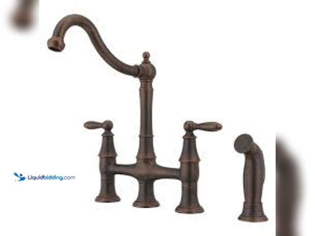 Lot 49-5448869 - Pfister Courant 2-Handle Bridge Kitchen Faucet with Side Spray in Rustic Bronze. Model # F-031-4COU....