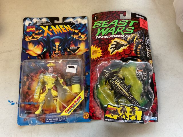 Lot 49-3708106 - Other LOT OF 2 NEW IN PACKAGES ACTION FIGURES INCLUDING X-MEN CAMERON HODGE AND TRANSFORMERS BEAST W...