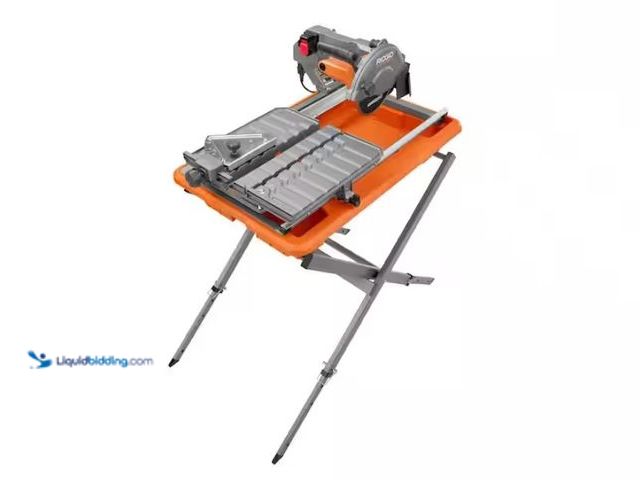 Lot 49-1567948 - RIDGID 9-Amp 7 in. Blade Corded Wet Tile Saw with Stand, Model # R4031S, Unused, Tested works.   Ref...