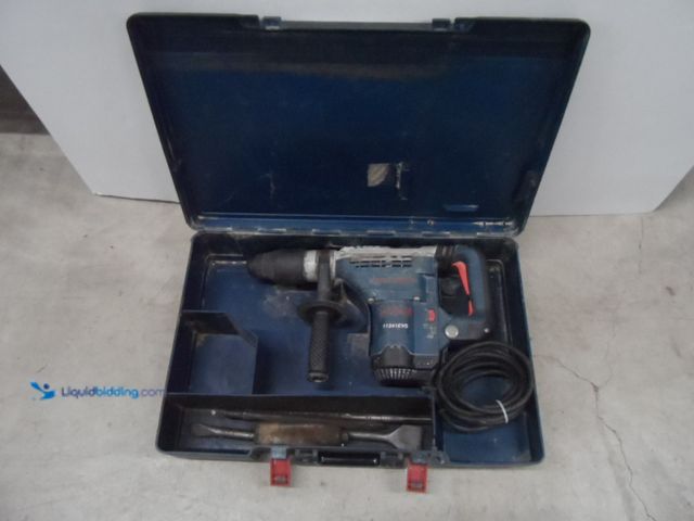 Lot 49-1806221 - 1 Bosch 11241EVS Electric Powered Hammer Drill Bosch Hammer Drill Used In Fair Working Condition, Do...