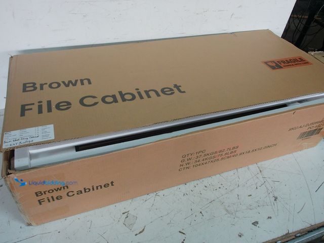 Lot 49-3631397 - Brown File Cabinet, New condition in open box.  Ref#BIN0730