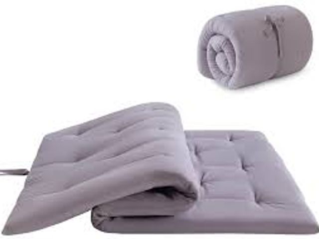 Lot 49-5436316 - Twin size futon mattress. Gray. Unused.