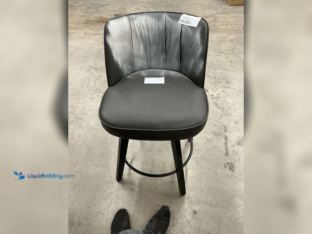 Lot 49-5581900 - BLACK MODERN FAUX LEATHER 360 SWIVEL HIGHT BACK BARSTOOL. USED. STAINED