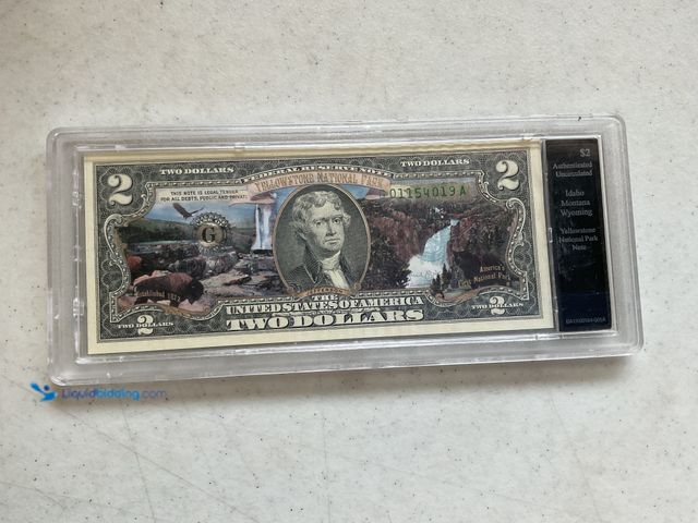 Lot 49-1804421 - RARE YELLOW STONE NATIONAL PARK COLORIZED $2 DOLLAR BILL