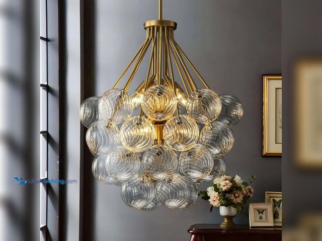 Lot 49-5413696 - RRTYO
Newlin 12-Light Mid-Century Modern Gold Sputnik Chandelier with Textured Glass Globe Accents ...