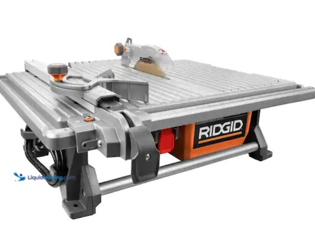 Lot 49-2020938 - RIDGID 6.5-Amp 7 in. Blade Corded Table Top Wet Tile Saw, Model # R4021,. MSRP: $179.00. Slightly us...