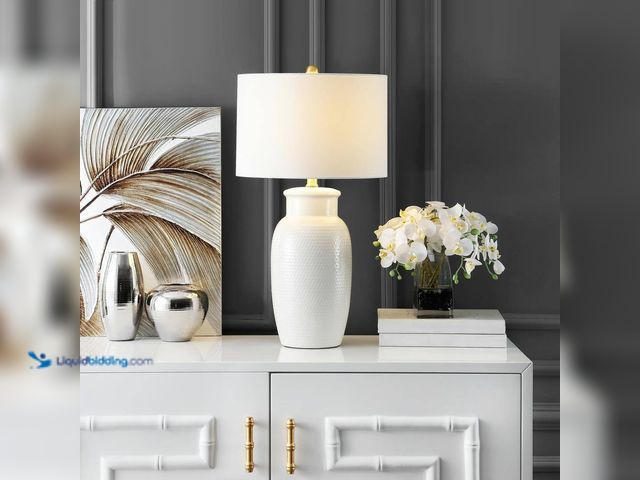 Lot 49-5482139 - SAFAVIEH Norsi 27.5 in. Ivory Table Lamp (unable to test) Unused