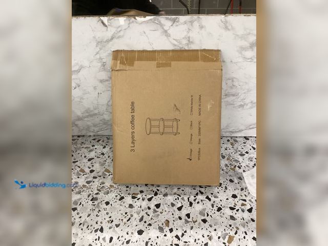 Lot 49-3527862 - 3 Layers Vintage Coffee Table Brown Item is unused.