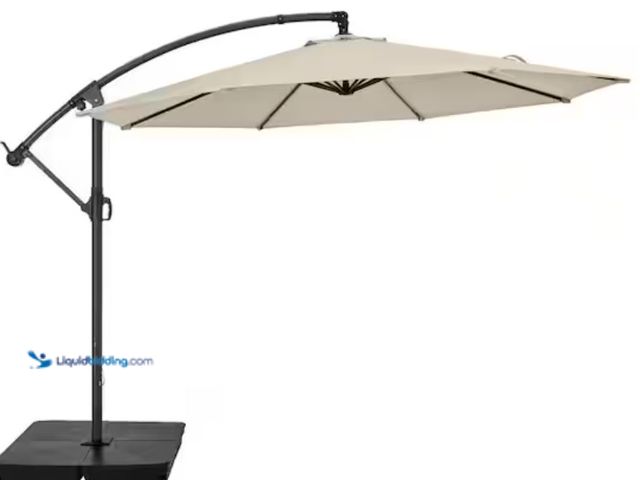 Lot 49-2005994 - StyleWell 10 ft. Steel Cantilever Market Patio Umbrella in Putty, Model # IT20597A-S-SE, Unused, Has...