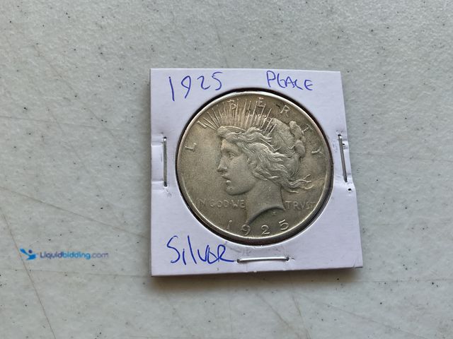 Lot 49-1804645 - 1925 PEACE ONE DOLLAR COIN.
