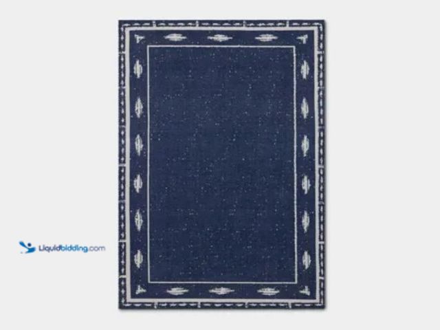Lot 49-5552734 - Threshold Ikat Woven Area Rug, 5 x 7 ft - Blue. Unused. Slightly dirty from shipping.