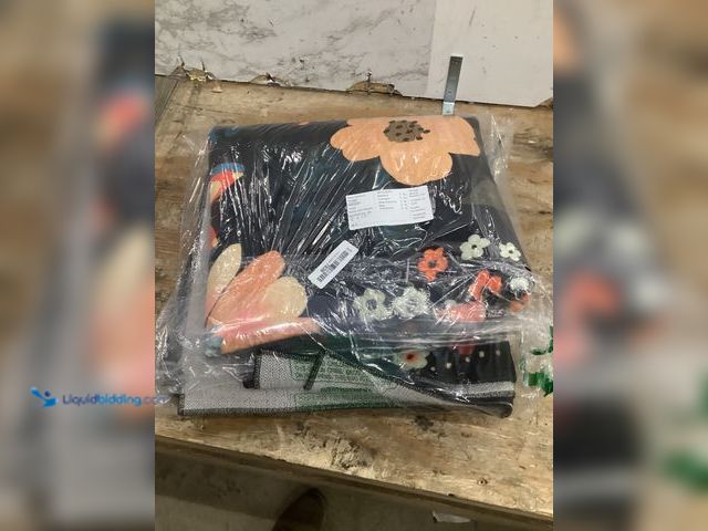 Lot 49-3528698 - Black rug with flower pattern 8x10 item is unused.