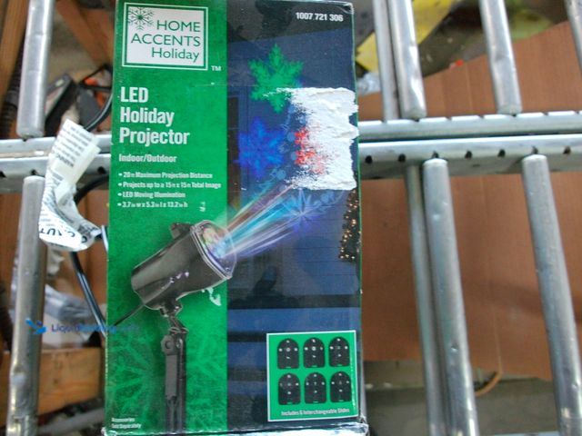 Lot 49-1542222 - LED Holiday Projector, Indoor/ Outdoor, 20 ft Maximum Projection Distance. Model# 1007721306, Slight...