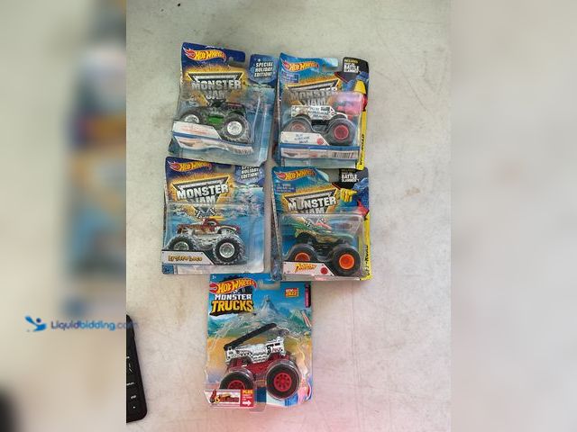 Lot 49-1505517 - COLLECTIBLE LOT OF 5 HOT WHEELS MONSTER TRUCKS 1/64 SCALE DIECAST IN ORIGINAL PACKAGES INCLUDING 5 A...