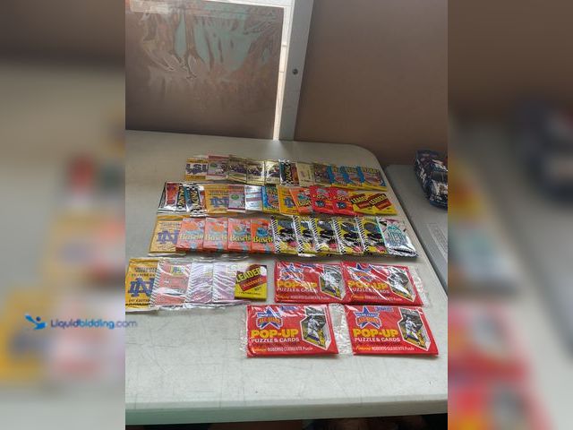 Lot 49-3609267 - Other TABLE LOT OF VARIOUS SPORT AND NON SPORT WAX PACKS ALL SEALED INCLUDING SCORE, TOPPS, DONRUSS ...