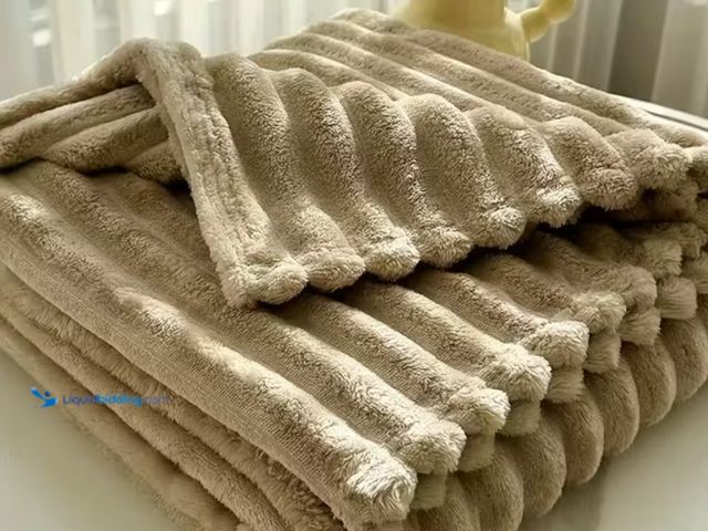 Lot 49-1816089 - 40” x 60” Khaki Colored Fleece Throw Blanket. New unused in original packaging.