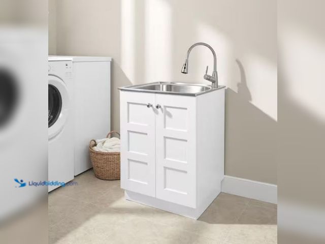 Lot 49-2005535 - Glacier Bay 24 in. W x 21 in. D x 34 in. L Stainless Steel Laundry Sink with Faucet and Double Doors...