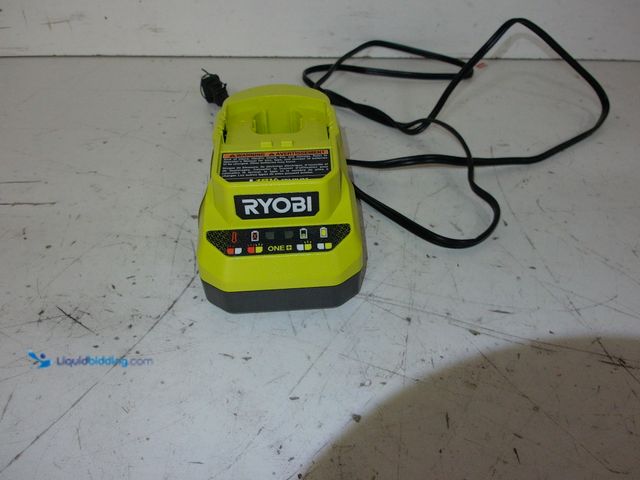 Lot 49-1627490 - RYOBI ONE+ 18V Lithium-Ion Charger Model # PCG002, Slightly Used, Powers On, Has Different Power Cor...