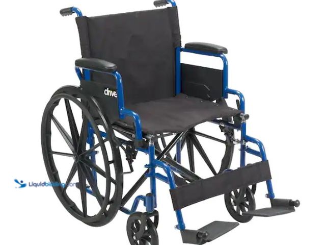 Lot 49-1574704 - Drive Medical Blue Streak Wheelchair with Flip Back Desk Arms, 18 in. Seat and Swing Away Footrest, ...