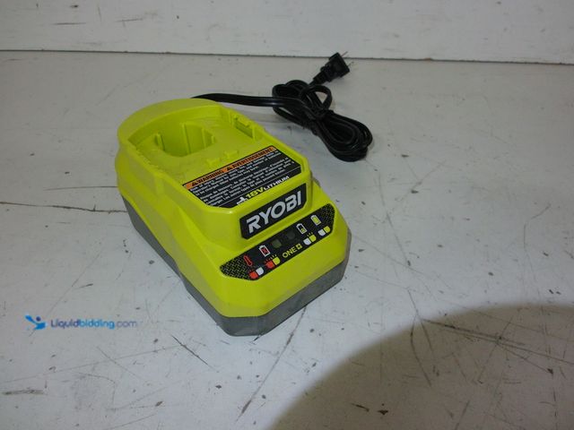 Lot 49-1624534 - RYOBI ONE+ 18V Lithium-Ion Charger Model # PCG002, Slightly Used, Powers On, Has Different Power Cor...