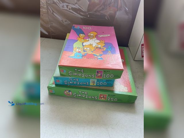 Lot 49-1804501 - LOT OF 3 VINTAGE THE SIMPSONS PUZZLES.