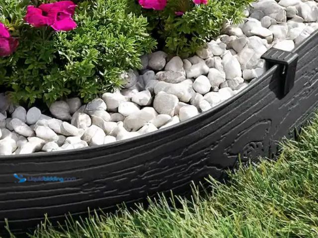 Lot 49-1623748 - Lot of (1) roll of Vigoro 20 ft. Black Composite Edging, Model # 55420, and (1) roll of Vigoro
20 f...