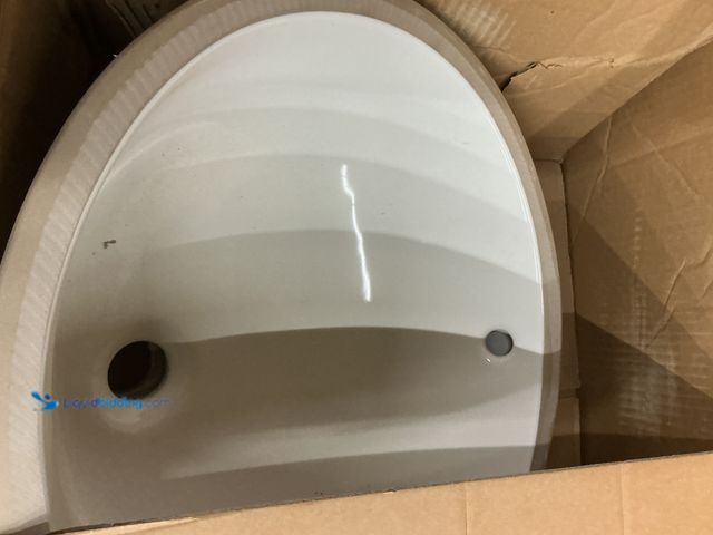 Lot 49-5450880 - Glacier Bay 19.5 in. Undermount Oval Vitreous China Bathroom Sink in White. Model # 14-028-W. Unused...