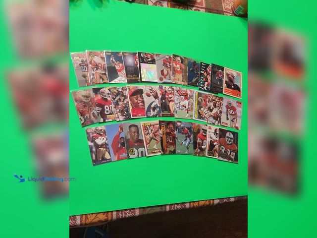 Lot 49-1913832 - 30- COLLECTIBLE JERRY RICE NFL FOOTBALL CARDS. VARIOUS BRANDS AND YEARS PRODUCED. ALL CARDS ARE IN P...