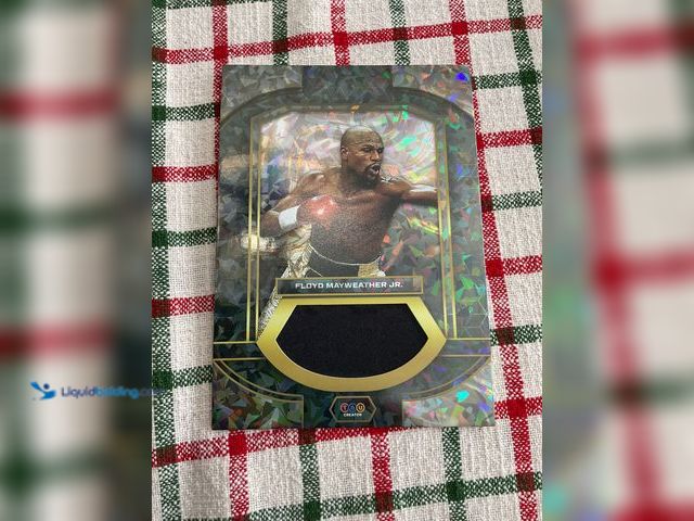 Lot 49-1505905 - COLLECTIBLE 2024 TRU CREATOR FLOYD MAYWEATHER JR AUTHENTIC RELIC CARD #COINS1211