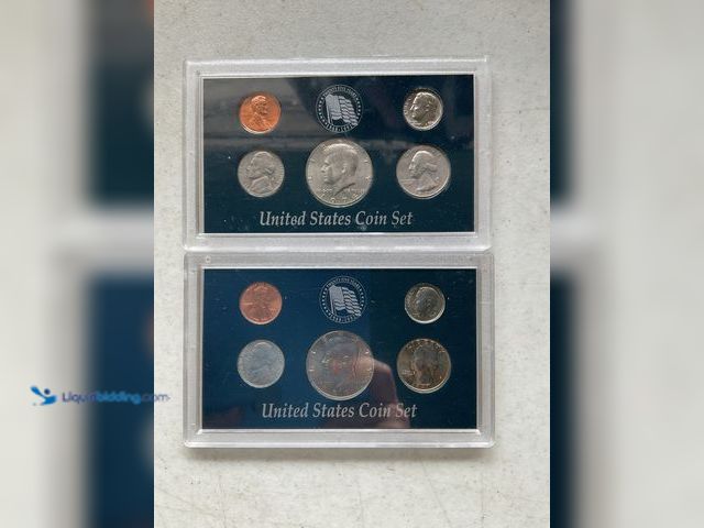 Lot 49-1830605 - LOT OF 2 UNITED STATES COIN SETS INCLUDING 1974 AND 1991. EACH SET CONTAINS 5 COINS IN HARD PLASTIC ...