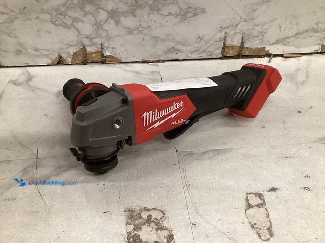 Lot 49-5573448 - Milwaukee 4 1/2 Grinder Tool, Unused with attachments only, works