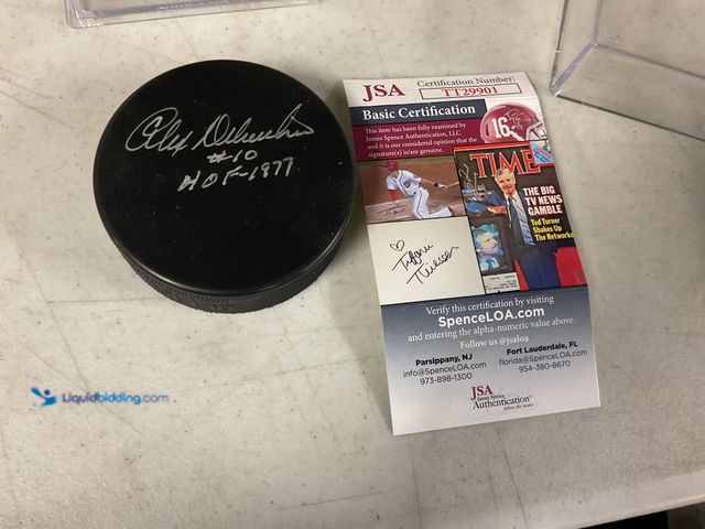 Lot 49-1505641 - COLLECTIBLE NICE DETROIT RED WINGS SUPERSTAR ALEX DELVECCHIO AUTOGRAPHED HOCKEY PUCK WITH JSA COA #C...