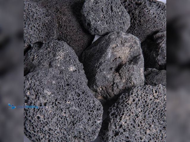 Lot 49-2024487 - Lot of (2)-  Fire Pit Essentials 10 lbs. Black Lava Rock 1 in. to 3 in. Model # 01-0649. MSRP $50. U...