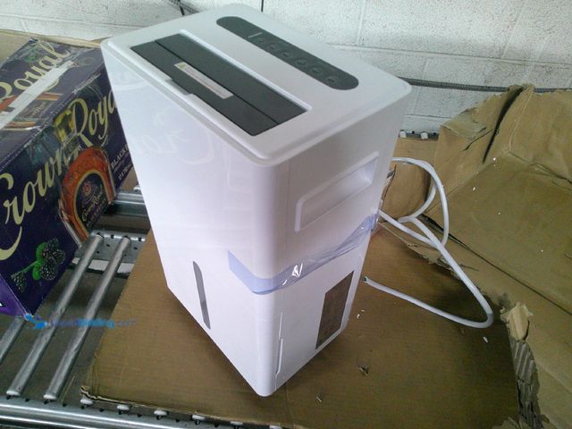Lot 49-1516351 - dehumidifier, cord cut, used, unable to test, shipping damage. IMPORTANT: Leave Item upright for 24 ...