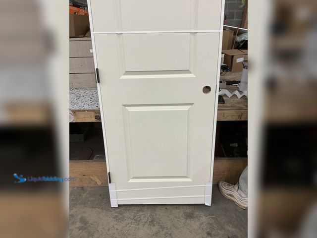 Lot 49-5450669 - Beige Door. 80'' x 30''. New. Scuffs and scratches present.