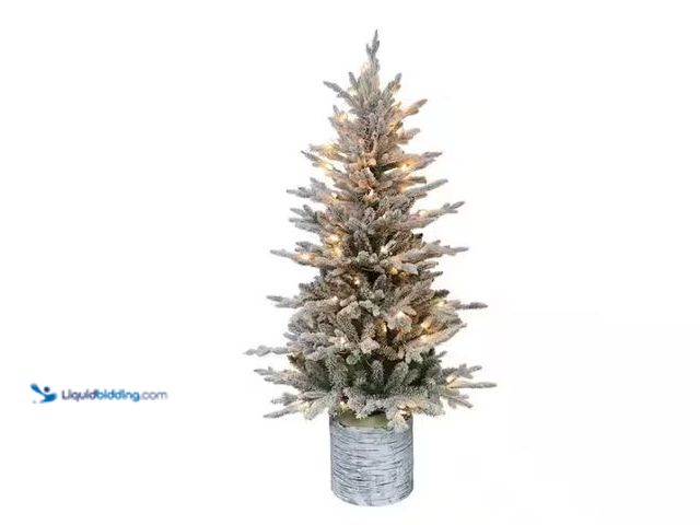 Lot 49-1542698 - Puleo International 4.5 ft. Prelit Flocked Arctic Fir Artificial Christmas Tree with 70 UL-Listed Cl...