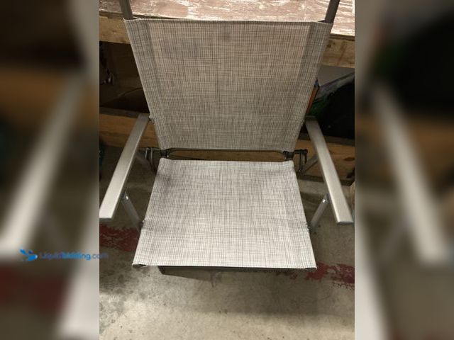 Lot 49-5549743 - outdoor folding lawn chair, khaki, 19"wide seat, 16" deep seat, 24" tall back. Unused