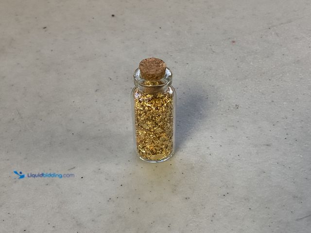 Lot 49-5467368 - RARE ONE INCH GLASS VILE OF PURE 24K GOLD FLAKES