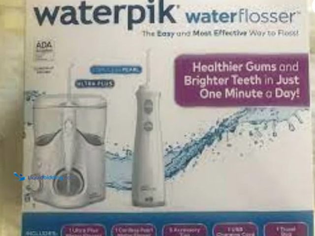 Lot 49-2026395 - Waterpik Ultra Plus and Cordless Pearl Water Flosser Combo Pack. Model #B0CH5HZX62.MSRP: $89.99. Unu...