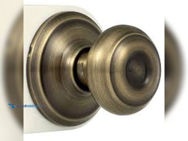 Lot 49-5476817 - QTY 2 - Schlage Georgian Antique Brass Passage Hall/Closet Door Knob. Model # F10 GEO 609. Unused.