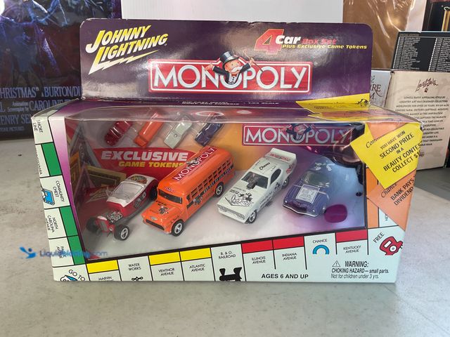 Lot 49-1505514 - COLLECTIBLE JOHNNY LIGHTNING MONOPOLY 4 CAR BOX SET PLUS EXCLUSIVE GAME TOKENS IN ORIGINAL BOX #COIN...