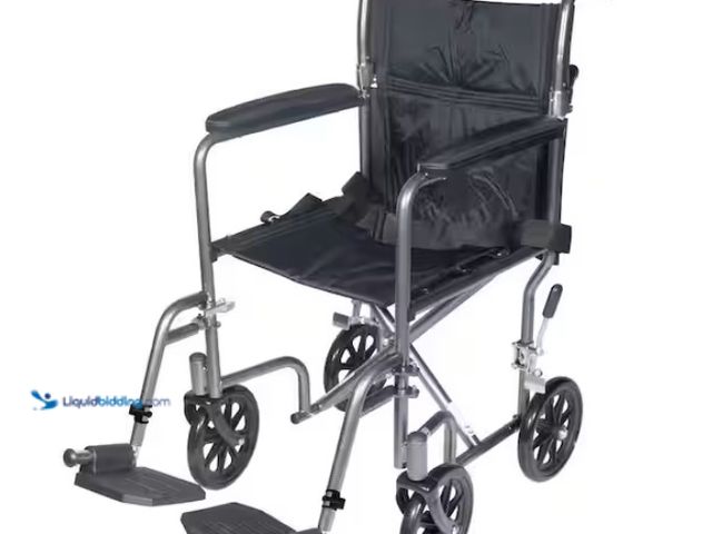 Lot 49-1574703 - Drive Medical Lightweight Steel Transport Wheelchair with Fixed Full Arms, Lightweight and durable s...